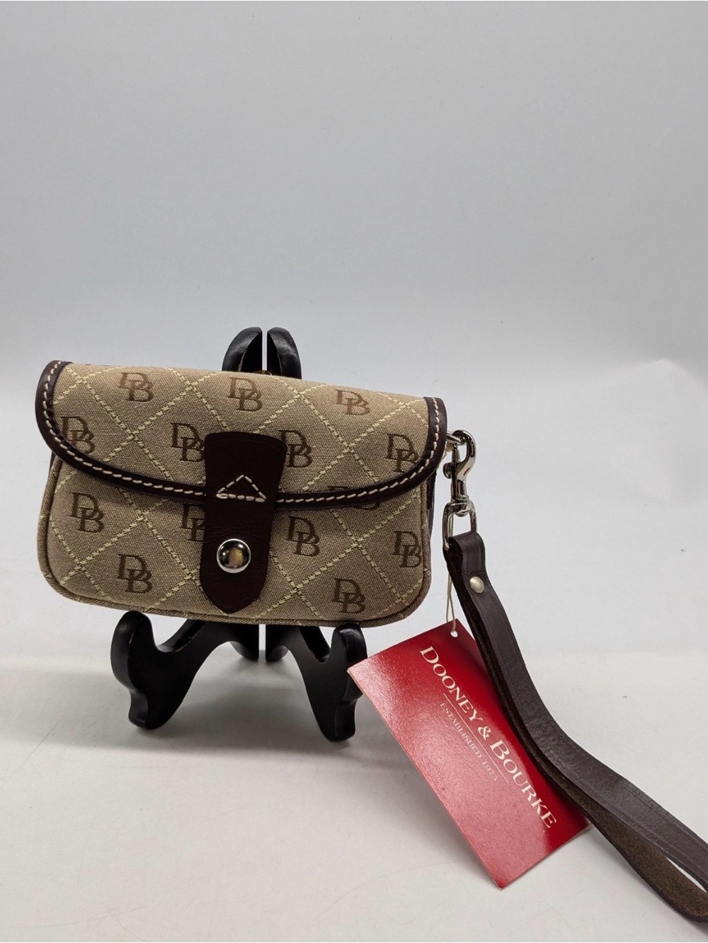 Dooney & Bourke Red and Brown Tag